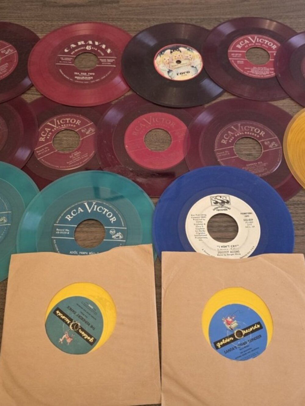 Lot of 15 colored 45 RPM Vinyl Record singles